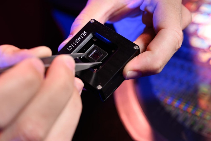 MetaOptics' single-layer glass metalens component is tipped by the Singapore startup to replace multi-layer plastic lenses in devices such as color cameras. The firm is aiming to raise net proceeds of S$4 million in a local stock-market listing on September 9, 2025, and use the proceeds partly to invest in an upgrade to its laser patterning process. Photo: MetaOptics.
