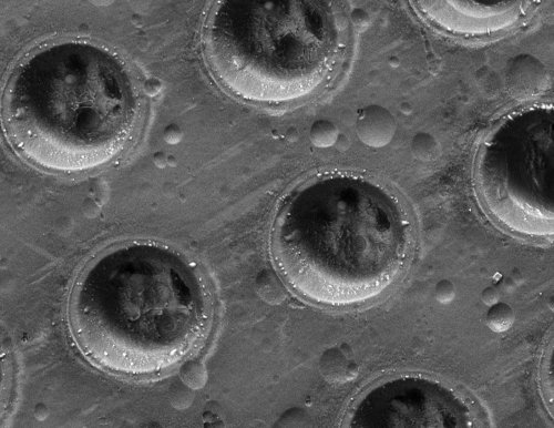 The team use a femtosecond laser to form an array of holes in aluminium