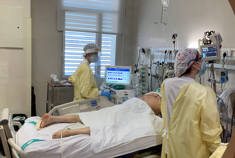 Medical personnel attending a Covid-19 patient in Spain.