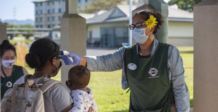 Temperature checks are conducted at the US Navy base in Hawaii. 