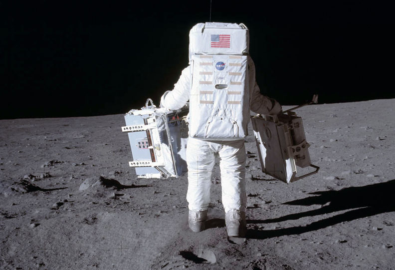Astronaut Edwin Aldrin deploys components on the Moon in 1969. Astronaut Edwin Aldrin deploys components on the Moon in 1969.