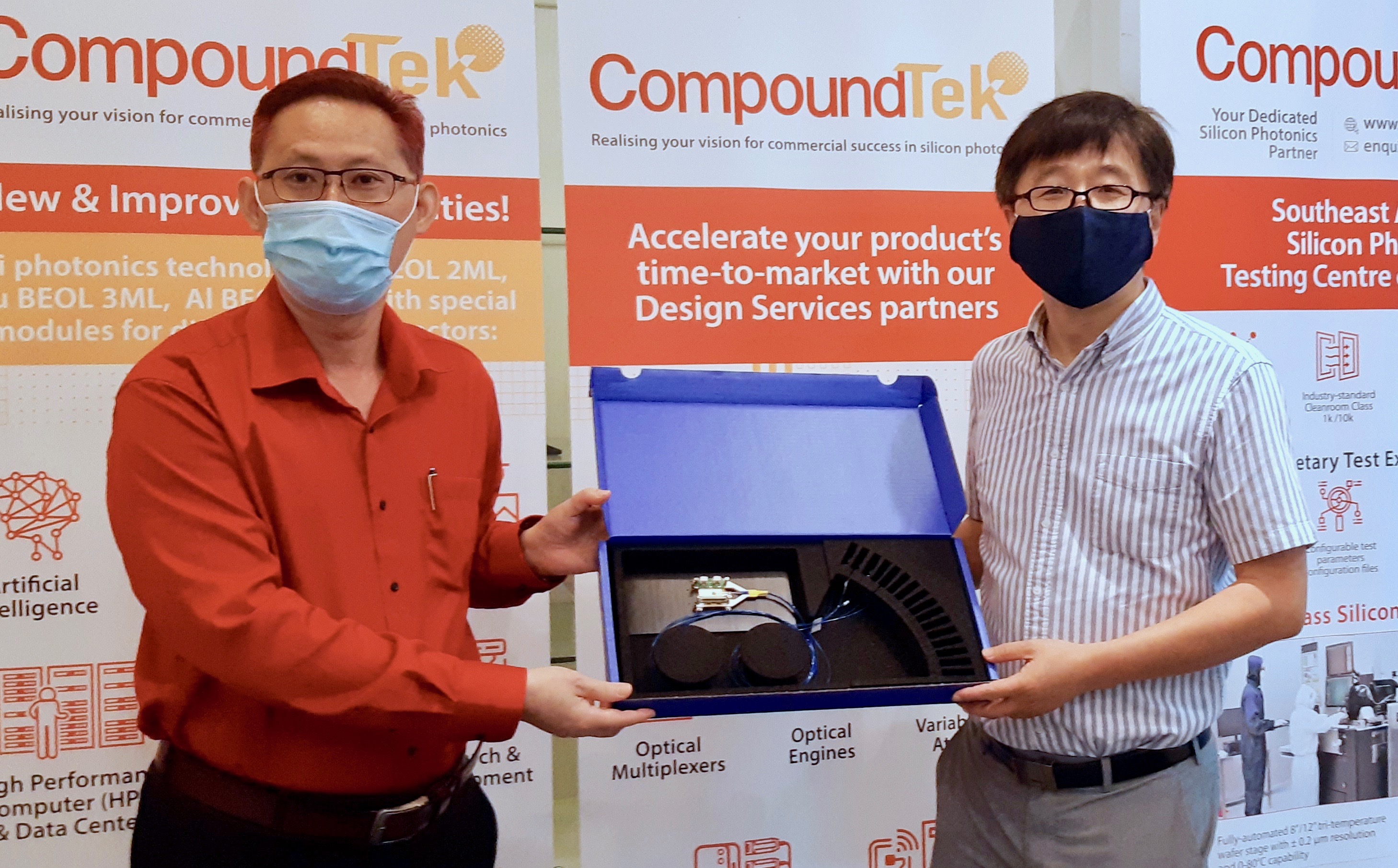 K.S. Ang, COO of CompoundTek, and Professor Wang, of NTU.