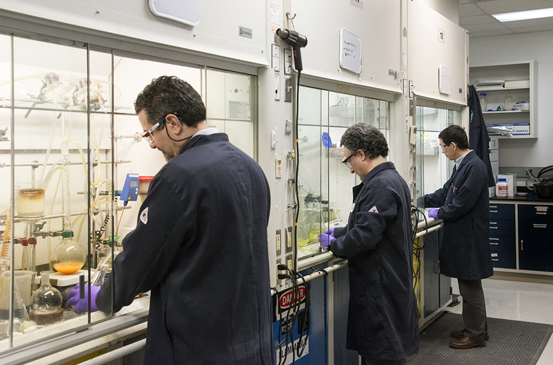 Universal Display chemists developing new OLED materials in the lab.