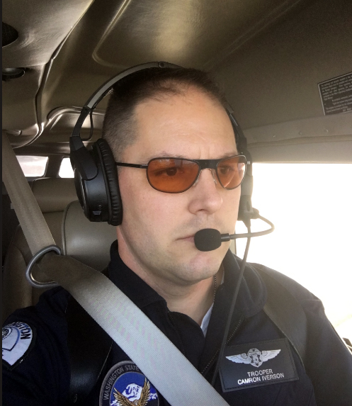 Flt Off'r Cameron Iverson of Washington State Patrol tests CALI protective lenses.