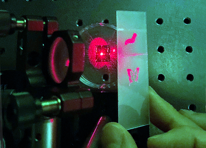 Holographic images depend on surrounding medium and wavelength used.