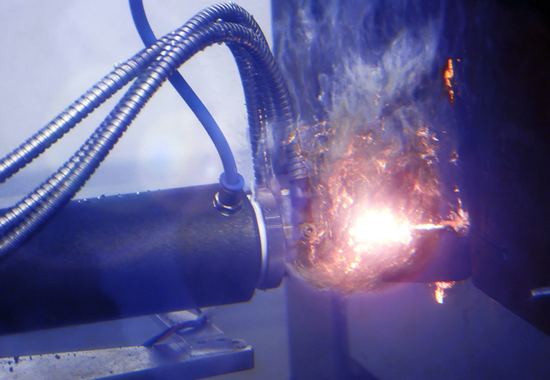 Metal is processed underwater with a laser.