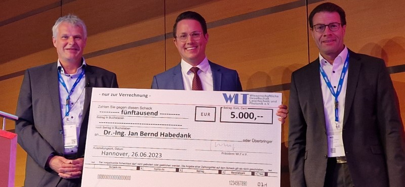 WLT Award: Ludger Overmeyer, Jan Bernd Habedank, and Christoph Leyens.