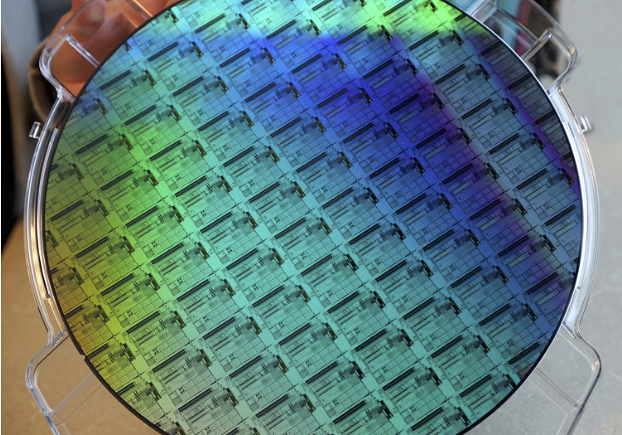Image of a silicon photonics wafer manufactured by AIM Photonics.