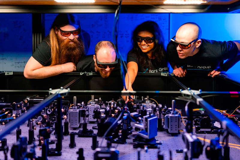 Nico Hauser (left) with other researchers from the Barz group.