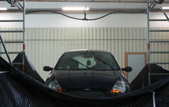 Stormy weather? A car tested under a rain simulator.