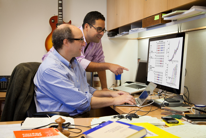 Power up: Eric Bitter (left) and Carlos Silva review conversion data.