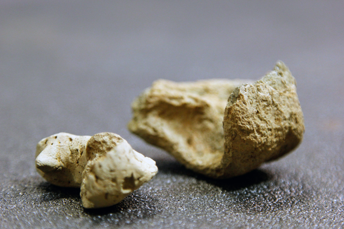 The larger of the two figurines could have been used as an oil lamp.