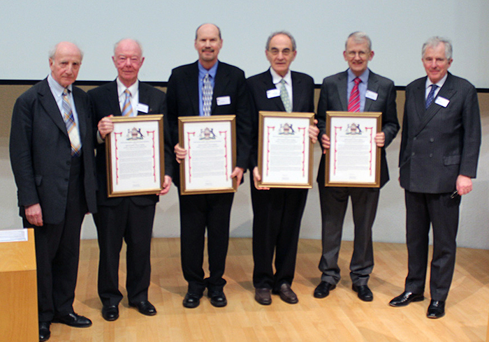 Winners: the strained layer laser developers at the prize-giving.