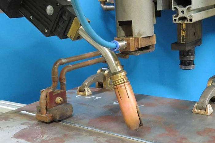 Experimental setup of the laser-GMA hybrid welding process.