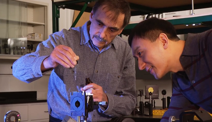 Professor Chunlei Guo (r) with Anatoliy Vorobyev, of Rochester's Institute of Optics. Professor Chunlei Guo (r) with Anatoliy Vorobyev, of Rochester's Institute of Optics.
