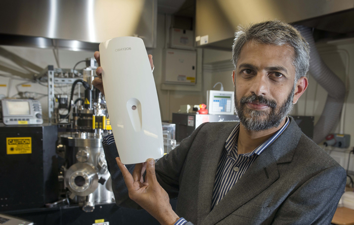 Painless: Professor Gin Jose with the prototype diabetes tester.