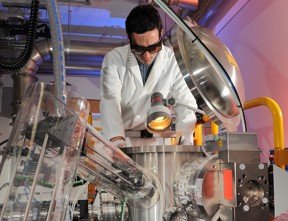 PLD in action – plasma plume transferring to heated substrate for garnet film growth.