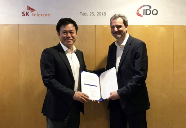 It's a deal: SK Telecom's Park Jung-Ho and Grégoire Ribordy, CEO of ID Quantique.