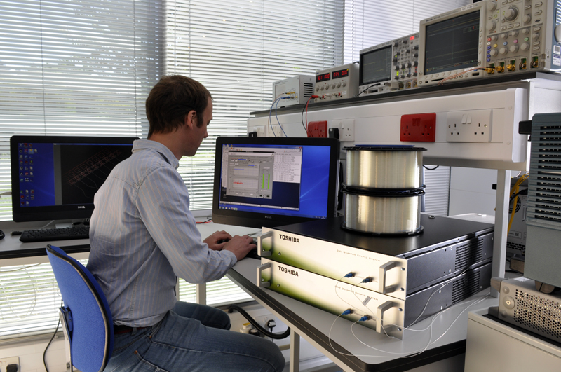 A Toshiba Research Europe scientist working on a QKD system.