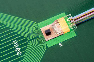 TSV-assisted FinFET CMOS/Si photonics transceiver prototype.