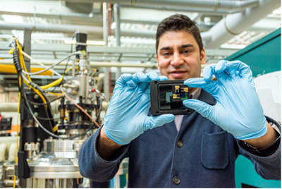 Solliance’s Dr. Mehrdad Najafi holding two samples. 