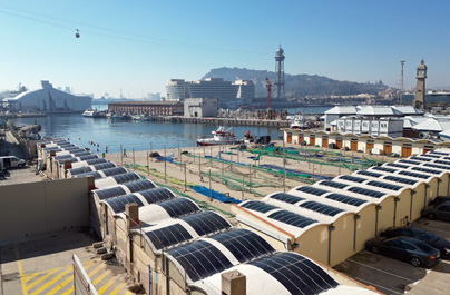 Barcelona port facilities with HeliaSol glued to undulating rooftops.