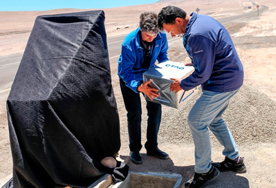 Installing the time-capsule at the inauguration of CTAO-South.