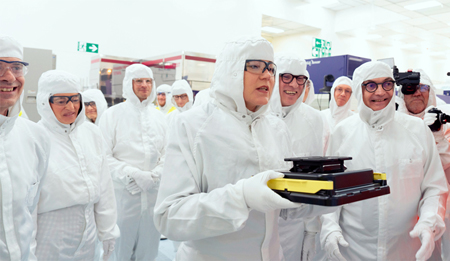 The chips are up: attendees at the opening of imec's NanoIC pilot line.