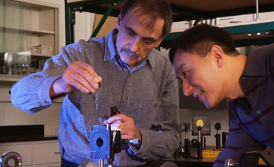 Professor Chunlei Guo (r) with Anatoliy Vorobyev, of Rochester's Institute of Optics.