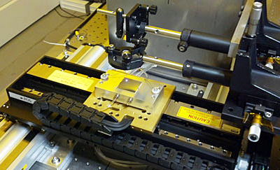 Natcore laser system; the infrared beam appears as a white spot to the camera.