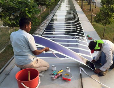 Power walking: Heliatek film is fitted to a covered walkway at Singapore's Seletar Airport.