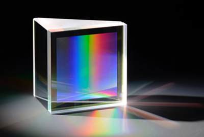 Directly bonded fused silica GRISM (grating + prism).