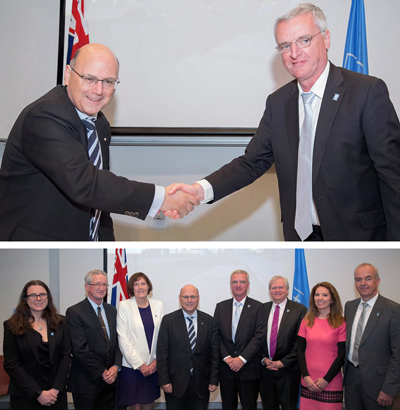 It's a deal: Australia's Arthur Sinodinos (L, top) and ESO's Tim de Zeeuw. 