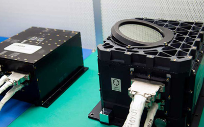 OLA's electronics box (left), which stores collected data, and its sensor head (right). 