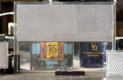 Opaque form (above) turns transparent when filled with index-matching fluid (below).